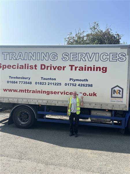 Carl celebrates passing his Cat C HGV test in Tewkesbury with MT Training Services